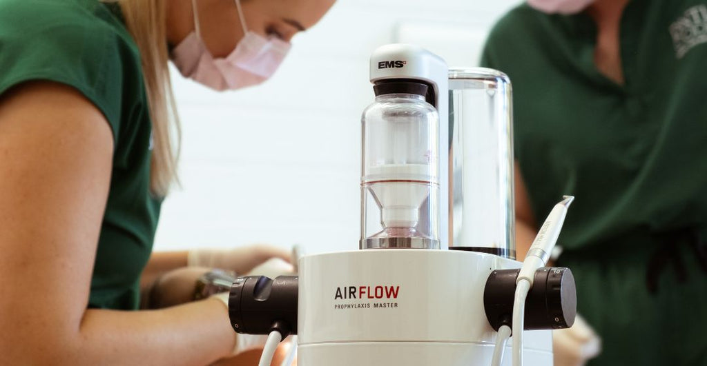 image of machine and a dermatologist doing treatment