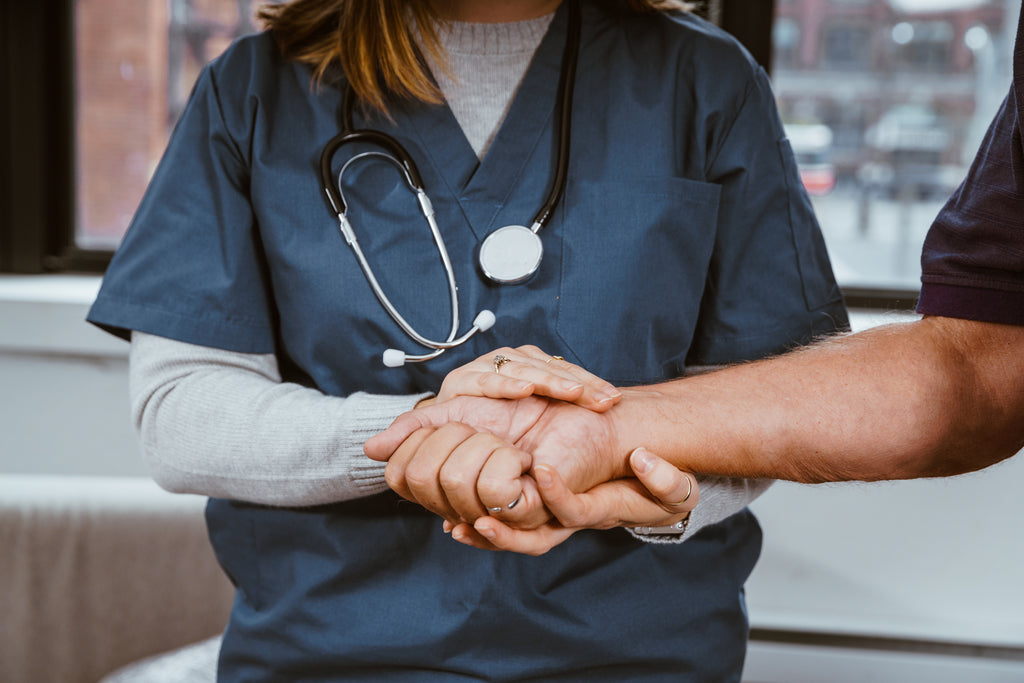 image of nurse helping patient