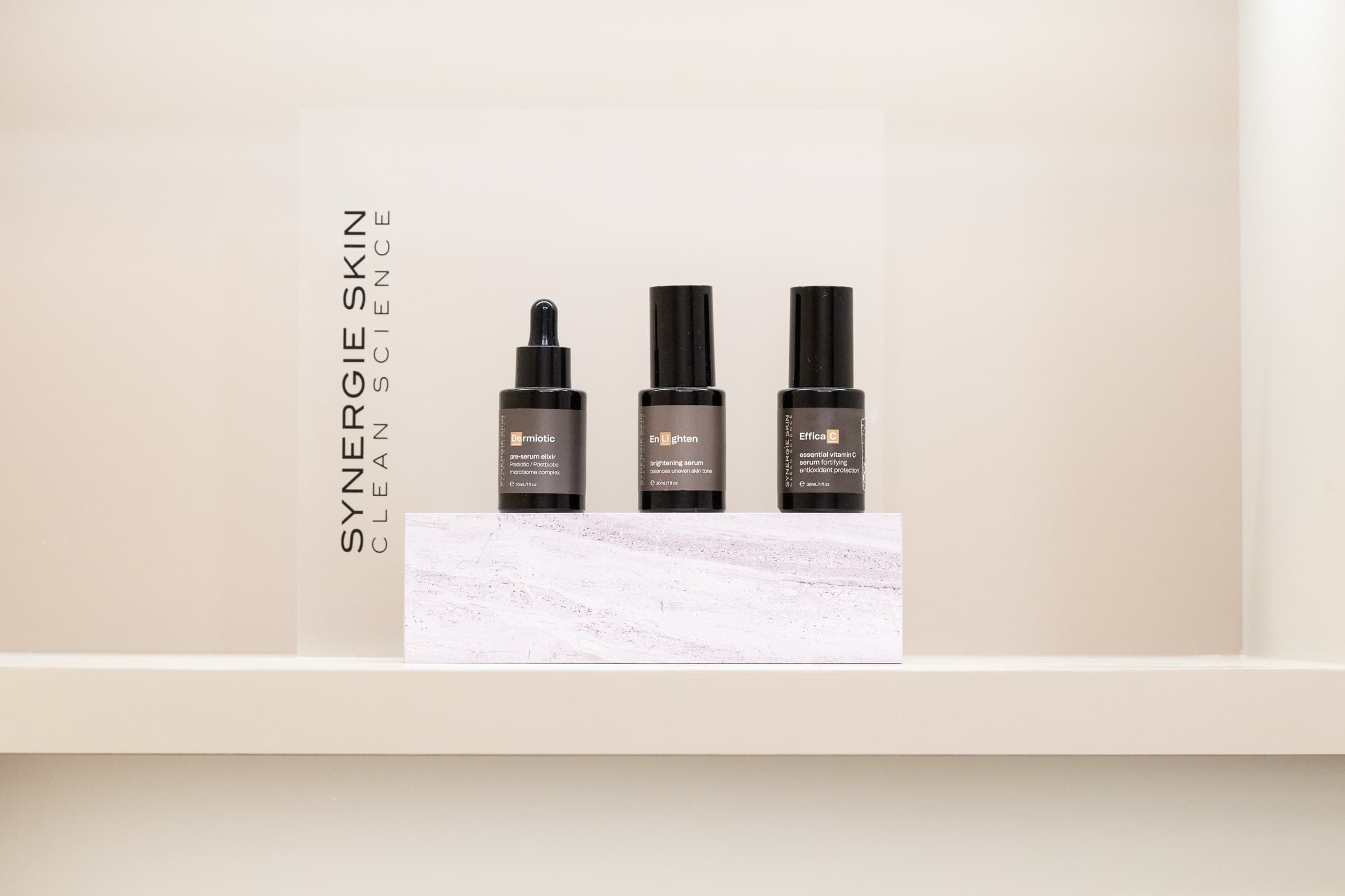 Synergie skincare serums on a shelf at DNTL Code