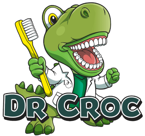 Dr Croc, our friendly crocodile dentist, holding a giant toothbrush