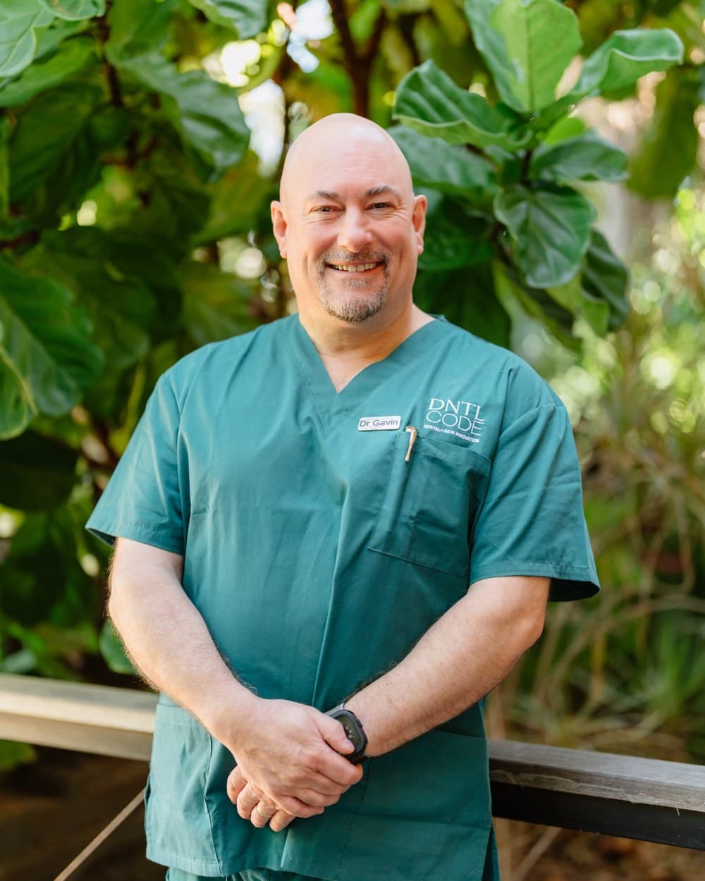 Dr Gavin Brown in DNTL Code scrubs