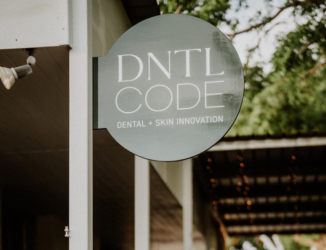 DNTL Code dental and skin innovation sign